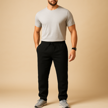 Men’s lightweight breathable trousers in relaxed fit, available in beige and sand, ideal for summer days, beachwear, and casual elegance.