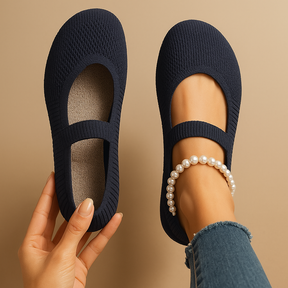 Women’s lightweight slip-on shoes with breathable perforations, cushioned insole, and non-slip sole in black, light grey, and blue.