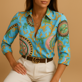 Woman wearing a lightweight printed blouse with a bold design, perfect for casual days, work, or elegant evenings