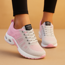 Breathable lightweight running sneakers for women in white, black, pink, and blue, ideal for fitness, walking, and casual wear.