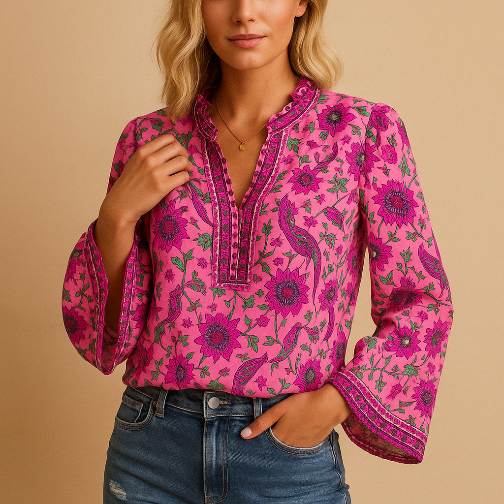 Airy spring blouse for women with a round neckline and flowy fit, ideal for warm-weather occasions and stylish everyday outfits.