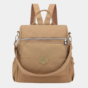 Women’s anti-theft crossbody backpack with hidden zippers, waterproof nylon, and convertible straps—ideal for travel and daily use.