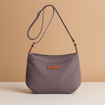 Waterproof anti-theft crossbody travel bag for women with wide strap, secure zip, and functional compartments for commuting or travel.