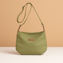 Waterproof anti-theft crossbody travel bag for women with wide strap, secure zip, and functional compartments for commuting or travel.