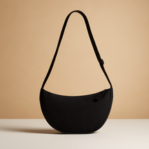 Anti-theft dumpling crossbody bag for women with ergonomic design, zippered closures, and secure strap for stylish daily wear and travel.
