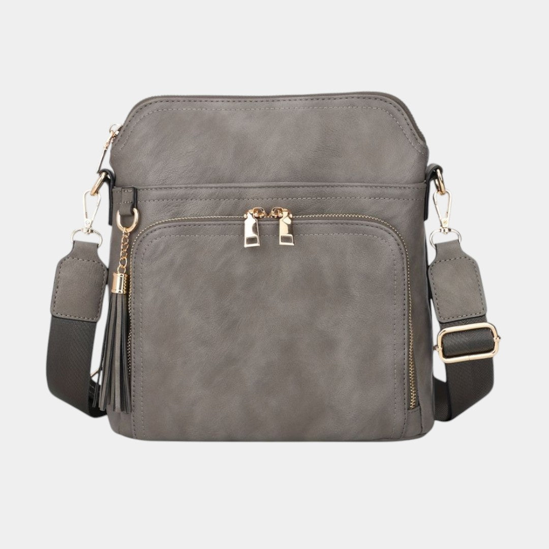 Women’s anti-theft crossbody bag with RFID blocking, hidden back pocket, card slots, and water-resistant faux leather design