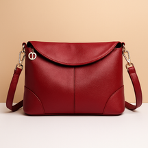 Anti-theft vegan leather crossbody bag for women with hidden back pocket, water-resistant finish, and versatile strap styling for secure daily wear.