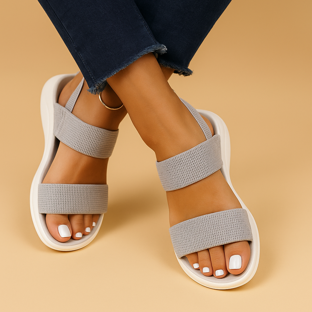 Isla breathable flat sandals for women in beige, black, and light brown with cushioned sole and adjustable fit for summer comfort.