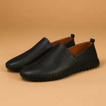Men’s breathable low-cut casual shoes with lightweight build and anti-slip sole, ideal for summer wear, driving, and everyday comfort.