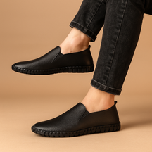 Men’s breathable low-cut casual shoes with lightweight build and anti-slip sole, ideal for summer wear, driving, and everyday comfort.