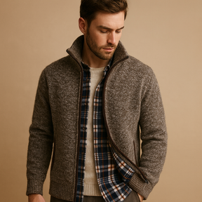 Men’s cable knit sweater with plaid inner lining, soft durable fabric, and timeless design for both casual and formal occasions.