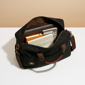 Canvas shoulder commuter bag for men with water-resistant fabric, padded gadget storage, anti-theft zippers, and adjustable strap for daily use.