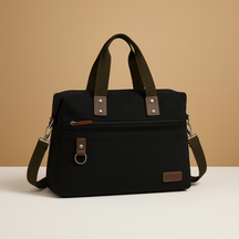 Canvas shoulder commuter bag for men with water-resistant fabric, padded gadget storage, anti-theft zippers, and adjustable strap for daily use.