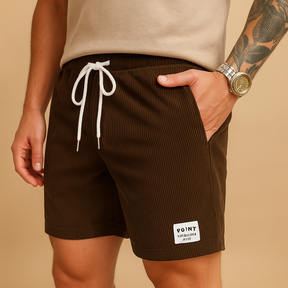 Men’s casual summer shorts with breathable fabric, elastic waistband, and adjustable drawstring, ideal for beach, lounging, or casual wear.