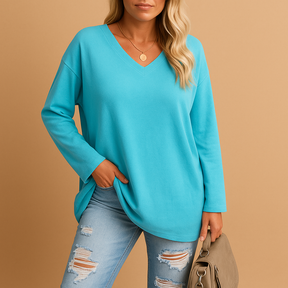 Casual summer top for women with short sleeves and round neckline, available in soft breathable fabric and various bright colors.