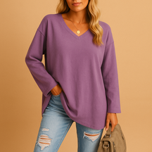 Casual summer top for women with short sleeves and round neckline, available in soft breathable fabric and various bright colors.