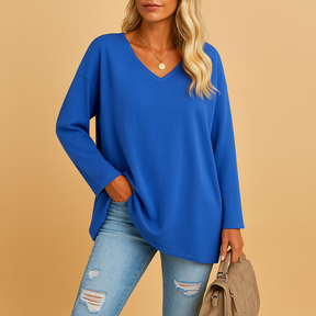 Casual summer top for women with short sleeves and round neckline, available in soft breathable fabric and various bright colors.