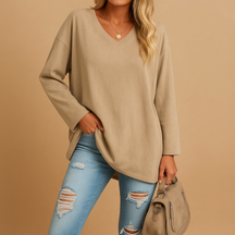 Casual summer top for women with short sleeves and round neckline, available in soft breathable fabric and various bright colors.