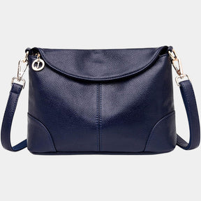 Women’s chic anti-theft crossbody bag made of vegan leather, featuring secure compartments, back pocket, and versatile shoulder straps