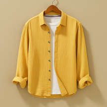 Men’s classic long sleeve button-down shirt with breathable fabric and slim fit, available in neutral and modern colours, perfect for casual or formal occasions.
