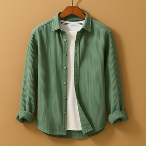 Men’s classic long sleeve button-down shirt with breathable fabric and slim fit, available in neutral and modern colours, perfect for casual or formal occasions.
