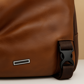 Men’s classy leather anti-theft crossbody bag with USB charging port, sleek design, and multiple compartments for travel and city use