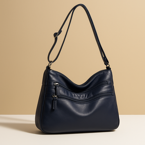 Compact anti-theft crossbody bag for women with secure zip closures, adjustable strap, and water-resistant design for everyday use.