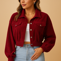 Cropped corduroy jacket for women with long sleeves, chest pockets, silver buttons, and classic collar in ribbed fabric.