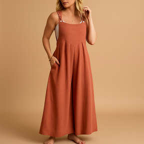 Women’s relaxed cotton dungaree jumpsuit with adjustable straps in various colours, ideal for summer, errands, and lounging in comfort