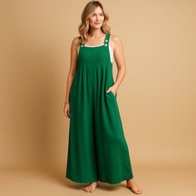 Women’s relaxed cotton dungaree jumpsuit with adjustable straps in various colours, ideal for summer, errands, and lounging in comfort
