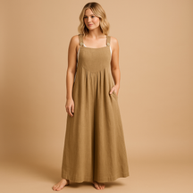 Women’s relaxed cotton dungaree jumpsuit with adjustable straps in various colours, ideal for summer, errands, and lounging in comfort