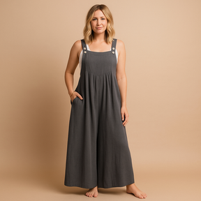 Women’s relaxed cotton dungaree jumpsuit with adjustable straps in various colours, ideal for summer, errands, and lounging in comfort