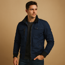 Men’s durable bomber jacket with tactical details, high collar, ribbed cuffs, and multiple pockets, perfect for everyday wear or outdoor activities.