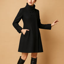 Elegant hooded winter coat for women with warm lining and tailored fit, ideal for formal looks and everyday winter wear.