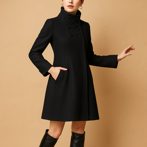 Elegant hooded winter coat for women with warm lining and tailored fit, ideal for formal looks and everyday winter wear.
