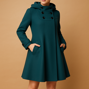 Elegant hooded winter coat for women with warm lining and tailored fit, ideal for formal looks and everyday winter wear.