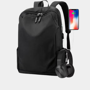 Men’s anti-theft travel backpack with USB port, water-resistant nylon fabric, and hidden security pockets for commuting and travel