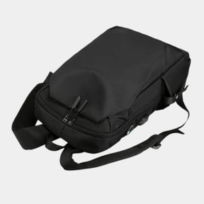 Men’s anti-theft travel backpack with USB port, water-resistant nylon fabric, and hidden security pockets for commuting and travel