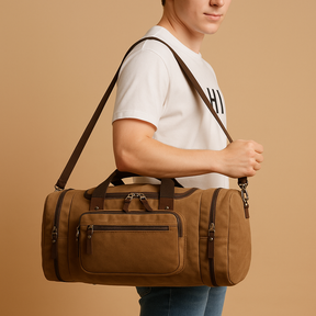 Men’s expandable cotton duffle bag with compartments, adjustable strap, and zippered pockets—ideal for travel or work trips.