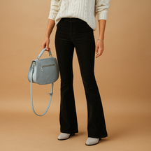 Women’s flared corduroy pants with ribbed texture and flattering fit, ideal for retro-inspired casual and semi-formal outfits.