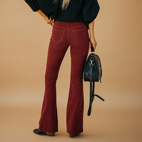 Women’s flared corduroy pants with ribbed texture and flattering fit, ideal for retro-inspired casual and semi-formal outfits.