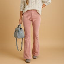 Women’s flared corduroy pants with ribbed texture and flattering fit, ideal for retro-inspired casual and semi-formal outfits.