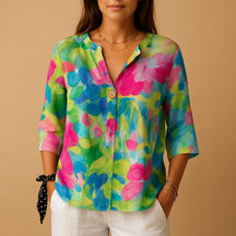 Floral blouse with relaxed fit for women featuring a classic collar and button-down front, ideal for spring, casual wear, or business looks.