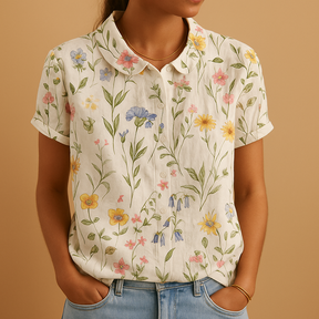 Women’s loose floral blouse with breathable fabric and multicolor flower pattern, ideal for casual summer days.
