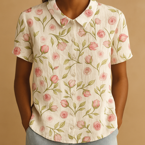 Women’s loose floral blouse with breathable fabric and multicolor flower pattern, ideal for casual summer days.