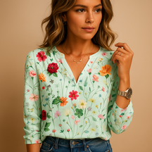 Floral V-neck blouse for women with long sleeves in breathable fabric, perfect for warm days or layering under a blazer.
