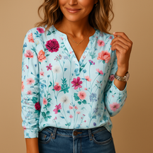 Floral V-neck blouse for women with long sleeves in breathable fabric, perfect for warm days or layering under a blazer.
