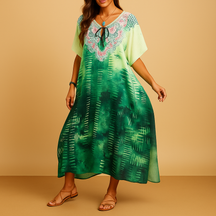 Flowy casual summer dress for women in breathable fabric with flattering fit, available in multiple colors for spring and summer occasions.