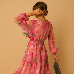 Flowy long summer dress with sleeves for women, featuring an A-line silhouette and lightweight fabric, ideal for casual and semi-formal summer occasions.