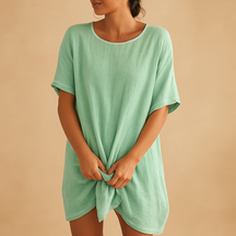 Flowy midi dress for women with breathable fabric, elegant silhouette, and knee-length cut, ideal for summer outings and festive occasions.